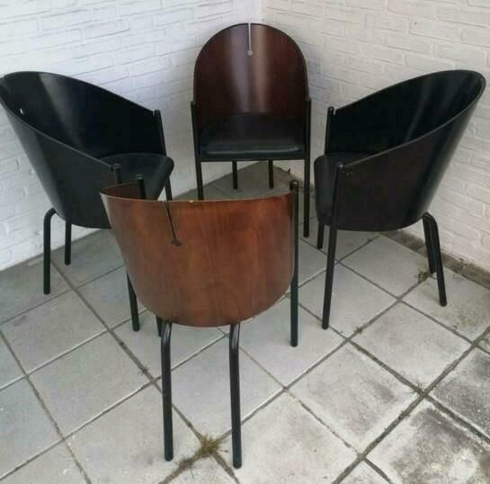 Vier vintage eetkamer stoelen zwart en bruin, leder en triplex